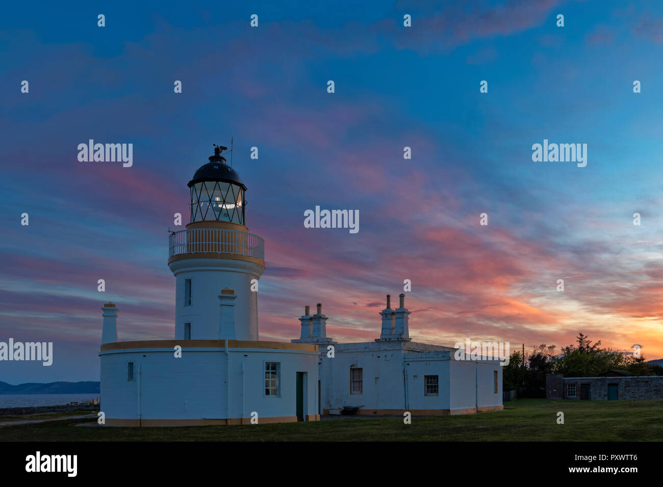 Regno Unito, Scozia, Black Isle, Chanonry Ness, Chanonry Point, Chanonry faro al tramonto Foto Stock