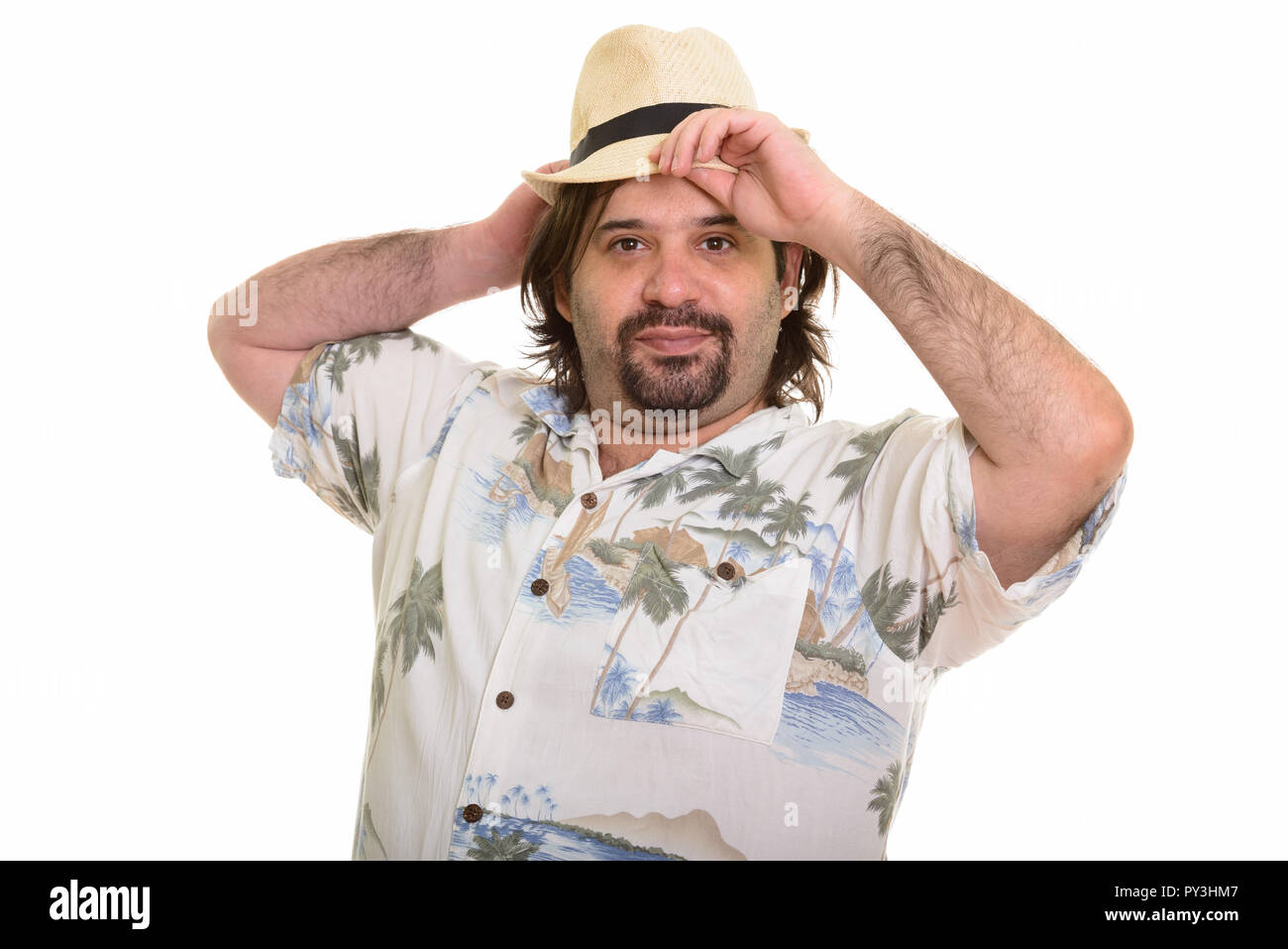 Fat uomo caucasico cappello di fissaggio pronta per le vacanze Foto Stock