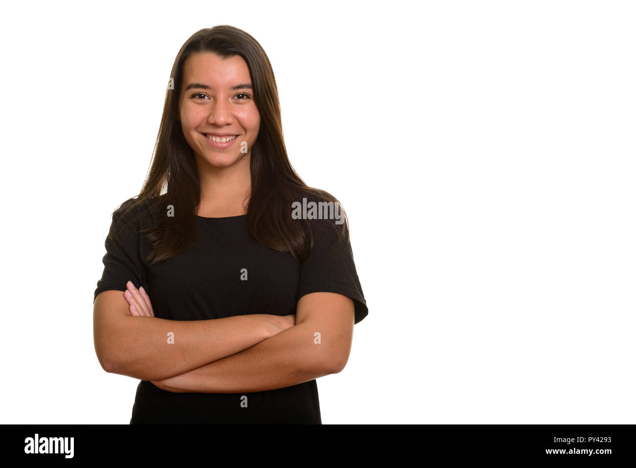 Giovani caucasici felice donna sorridente con le braccia incrociate Foto Stock