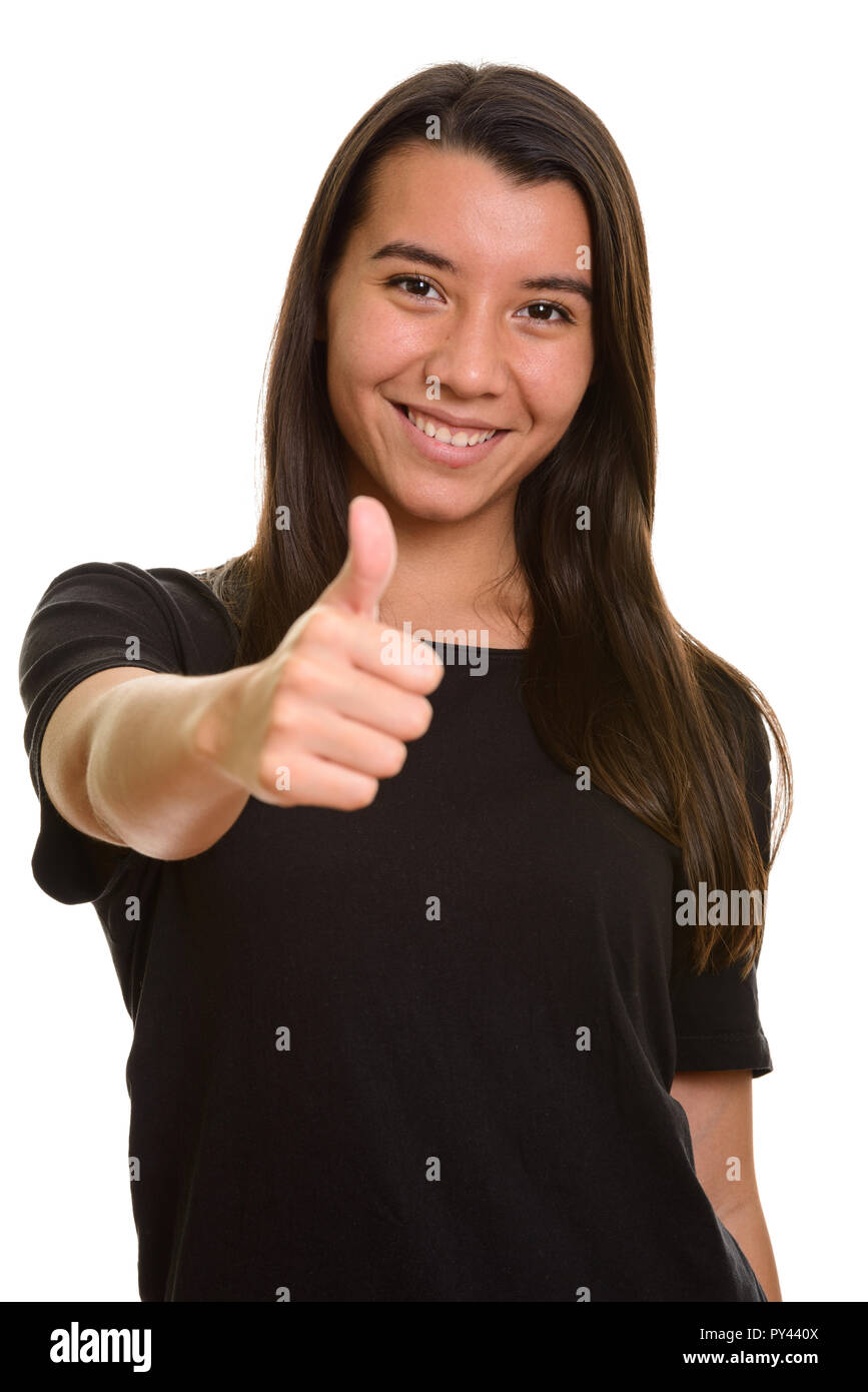 Giovani caucasici felice donna sorridente e dando pollice in alto Foto Stock