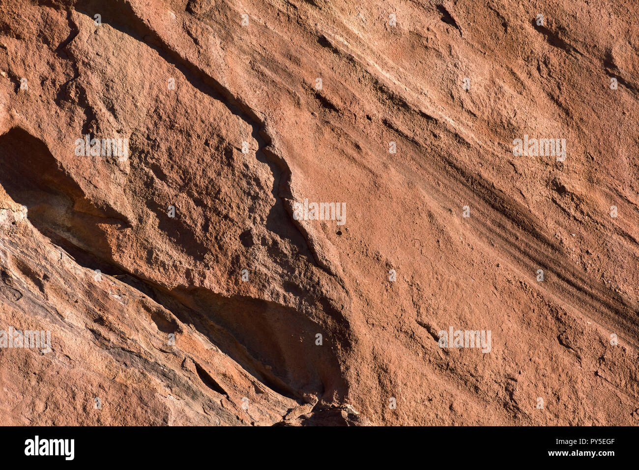 Il Red Rock vento texture usurati all'alba Foto Stock