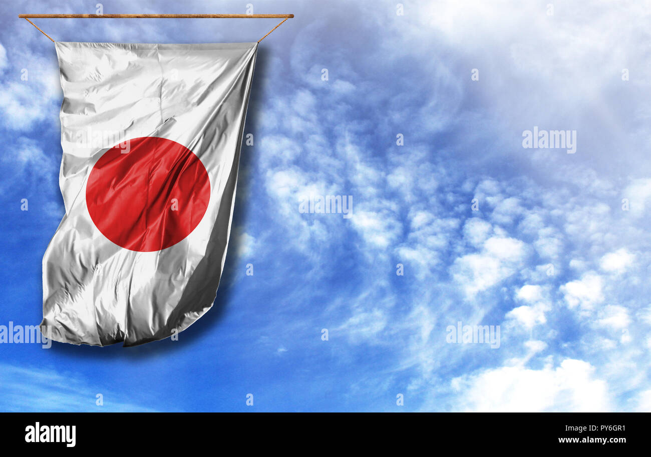 Bandiera del Giappone. Bandiera verticale, contro il cielo blu con posto per il testo Foto Stock