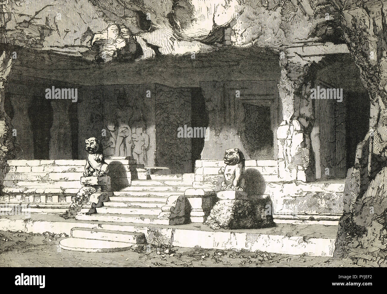 Custode lions a Elephanta Caves, isola Elephanta, porto di Mumbai, India Foto Stock