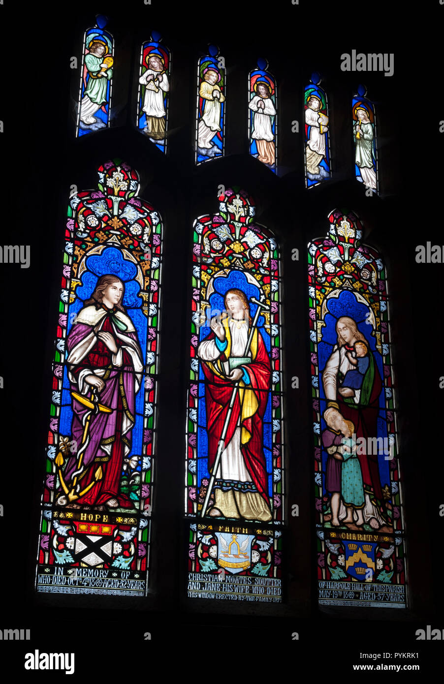 La speranza, di fede e di carità in vetro colorato, Chiesa di Tutti i Santi, Harpole, Northamptonshire, England, Regno Unito Foto Stock
