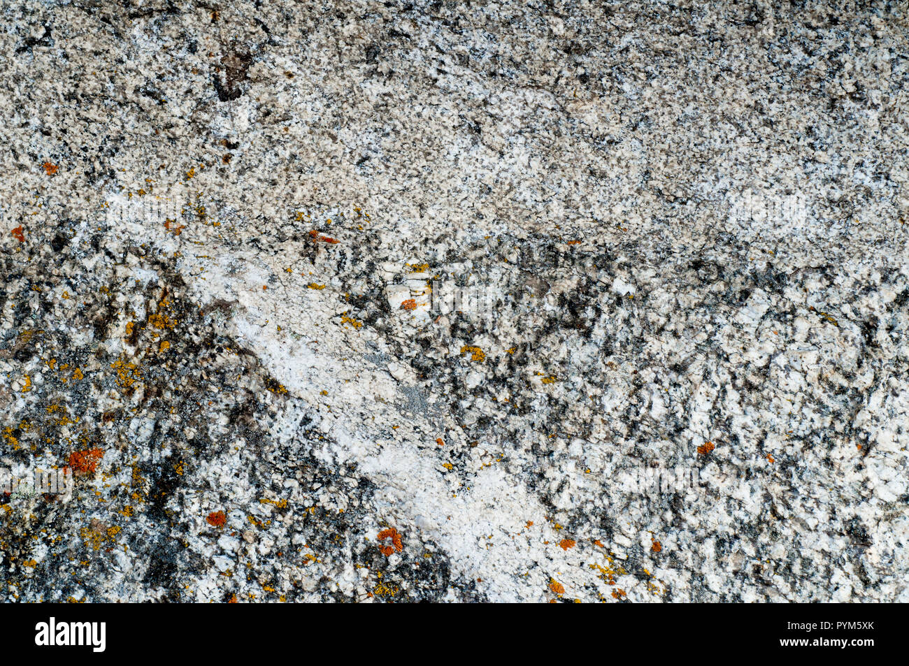 Almo Pluton granito (metà superiore - formato di circa 28 milioni di anni fa) in contatto con Green Creek granito complessi (metà inferiore - circa 2,8 miliardi di anni Foto Stock