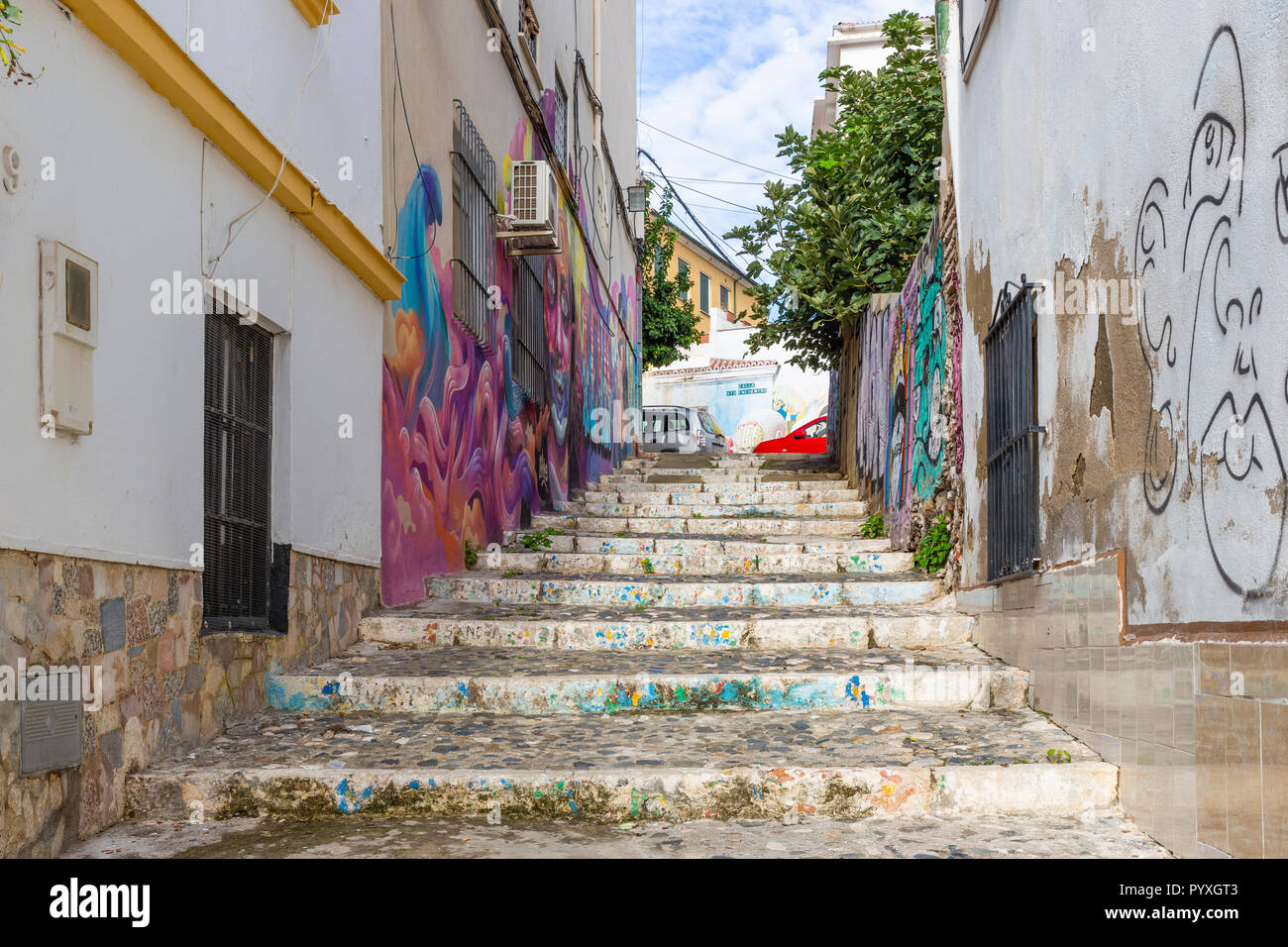 Street Art Graffiti in area povera di Malaga Spagna Foto Stock