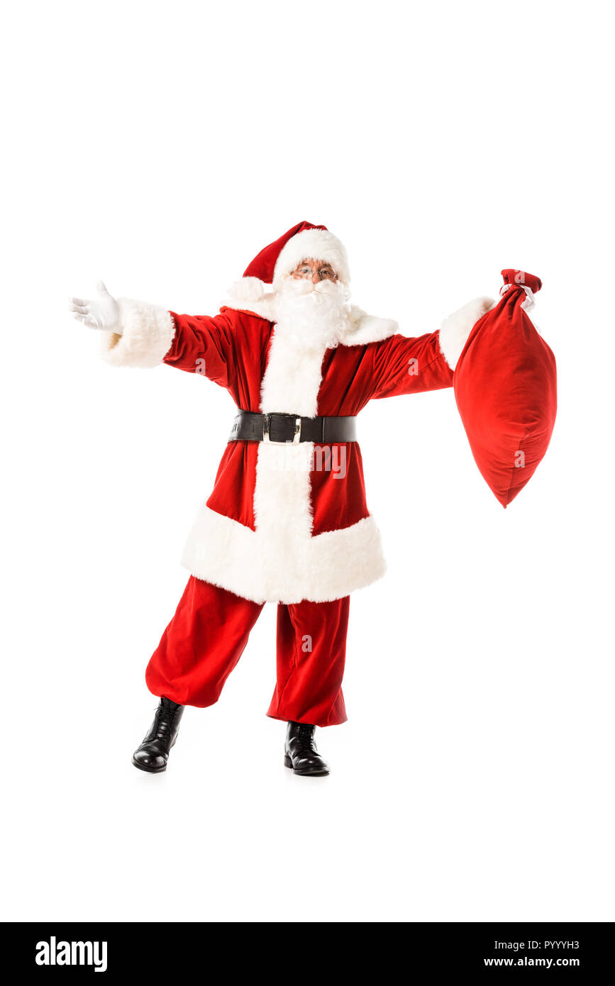 Babbo Natale con le braccia tese tenendo il sacco isolato su bianco Foto Stock