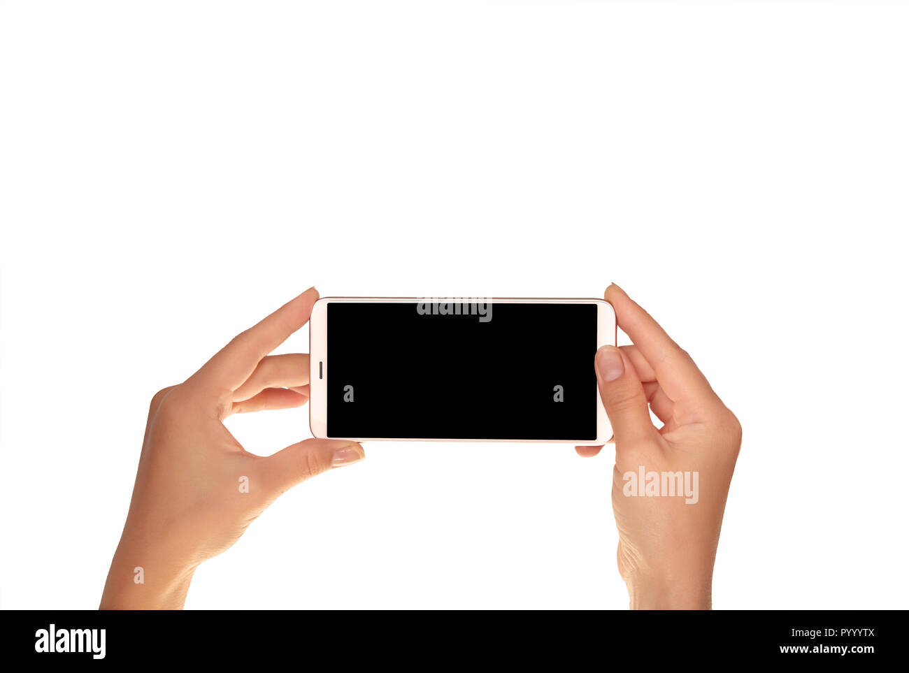 Mock-up dei moderni smartphone nelle mani di una ragazza. Telefono in posizione orizzontale con una schermata vuota e isolata su bianco Foto Stock