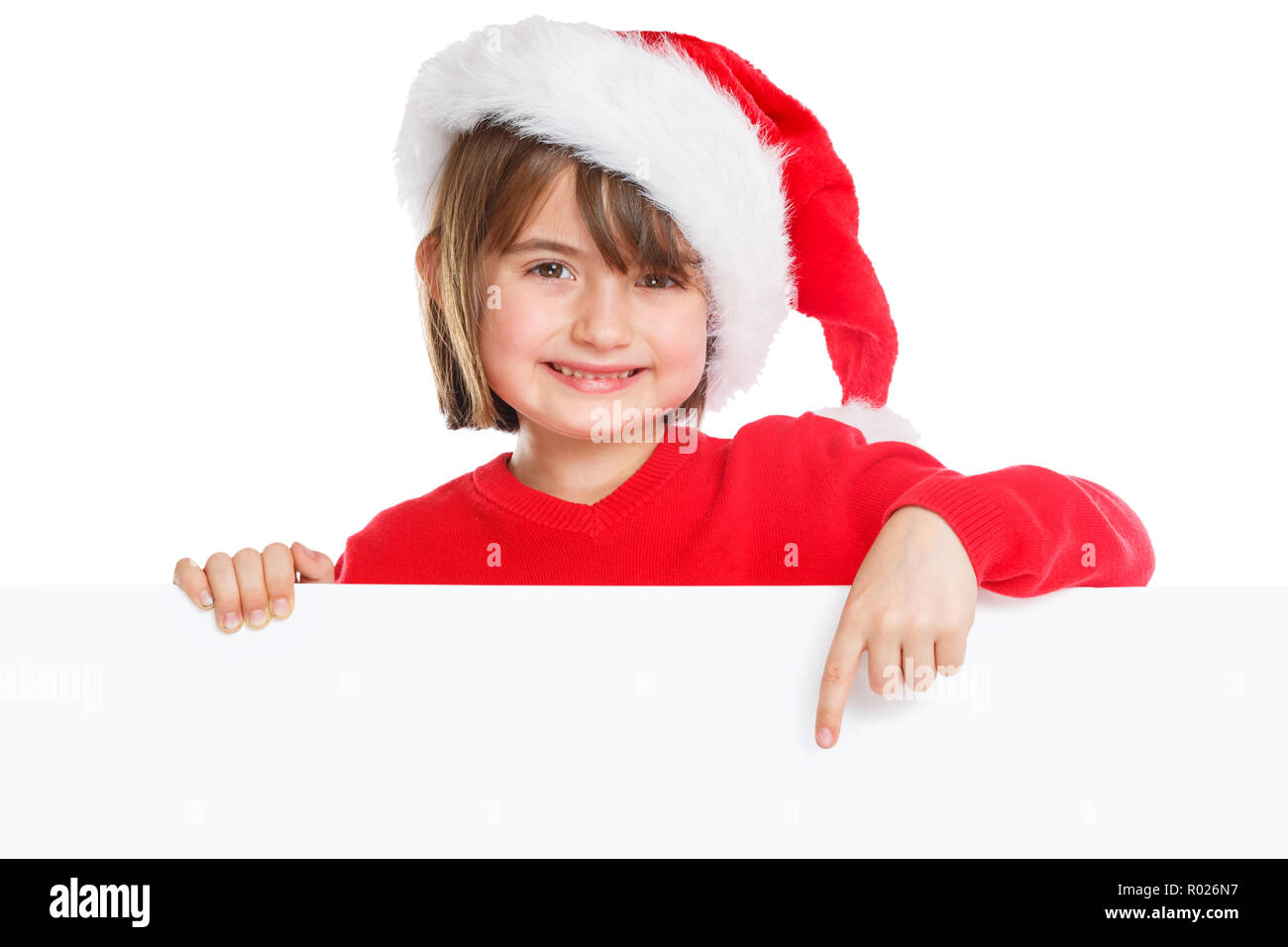 Bambino kid girl Christmas Santa Claus felice di puntamento vuoto copyspace banner spazio copia Foto Stock