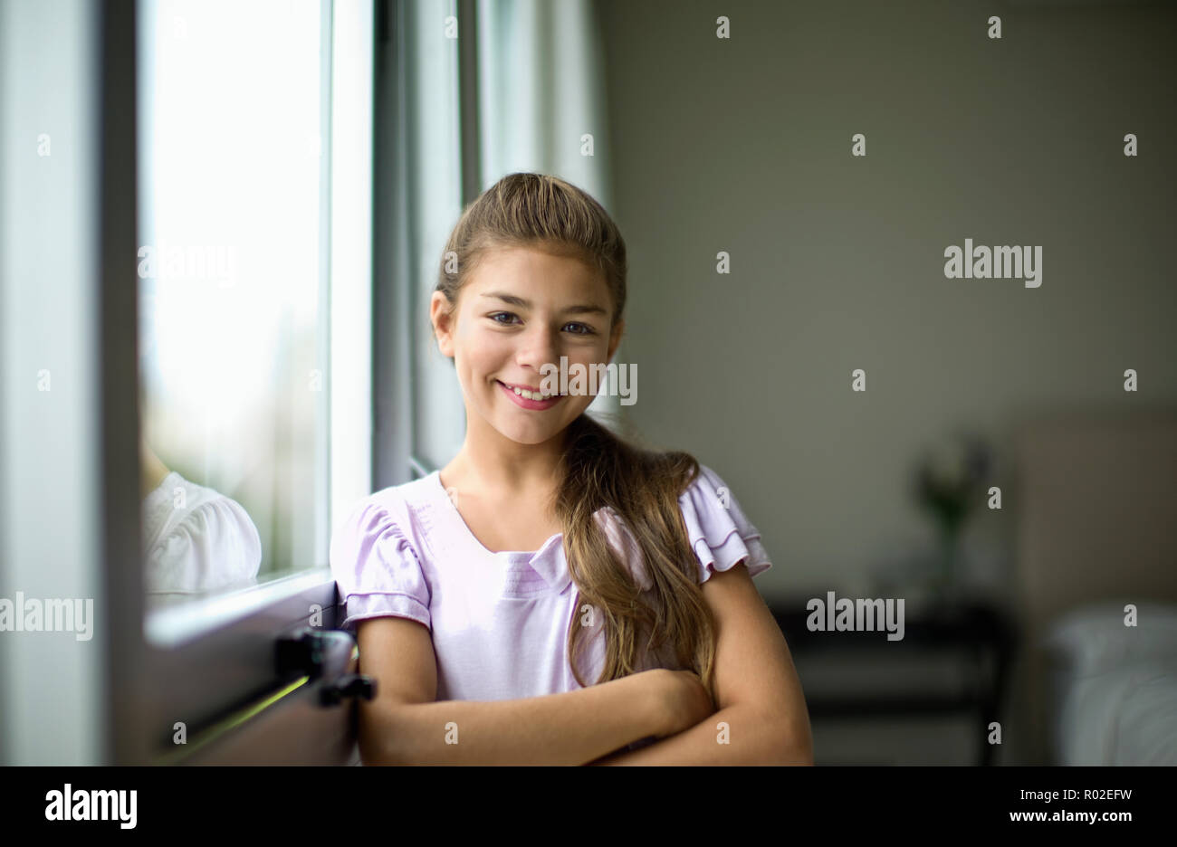 Ritratto di giovane sorridente ragazza. Foto Stock