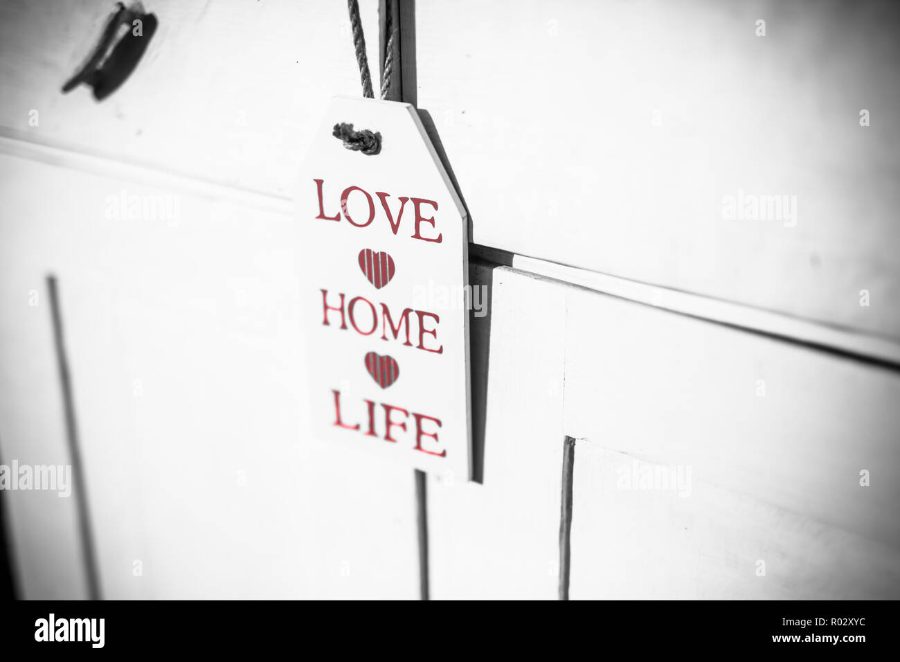 Amare la vita domestica di ispirazione decorazione home.messaggio motivazionale. Foto Stock