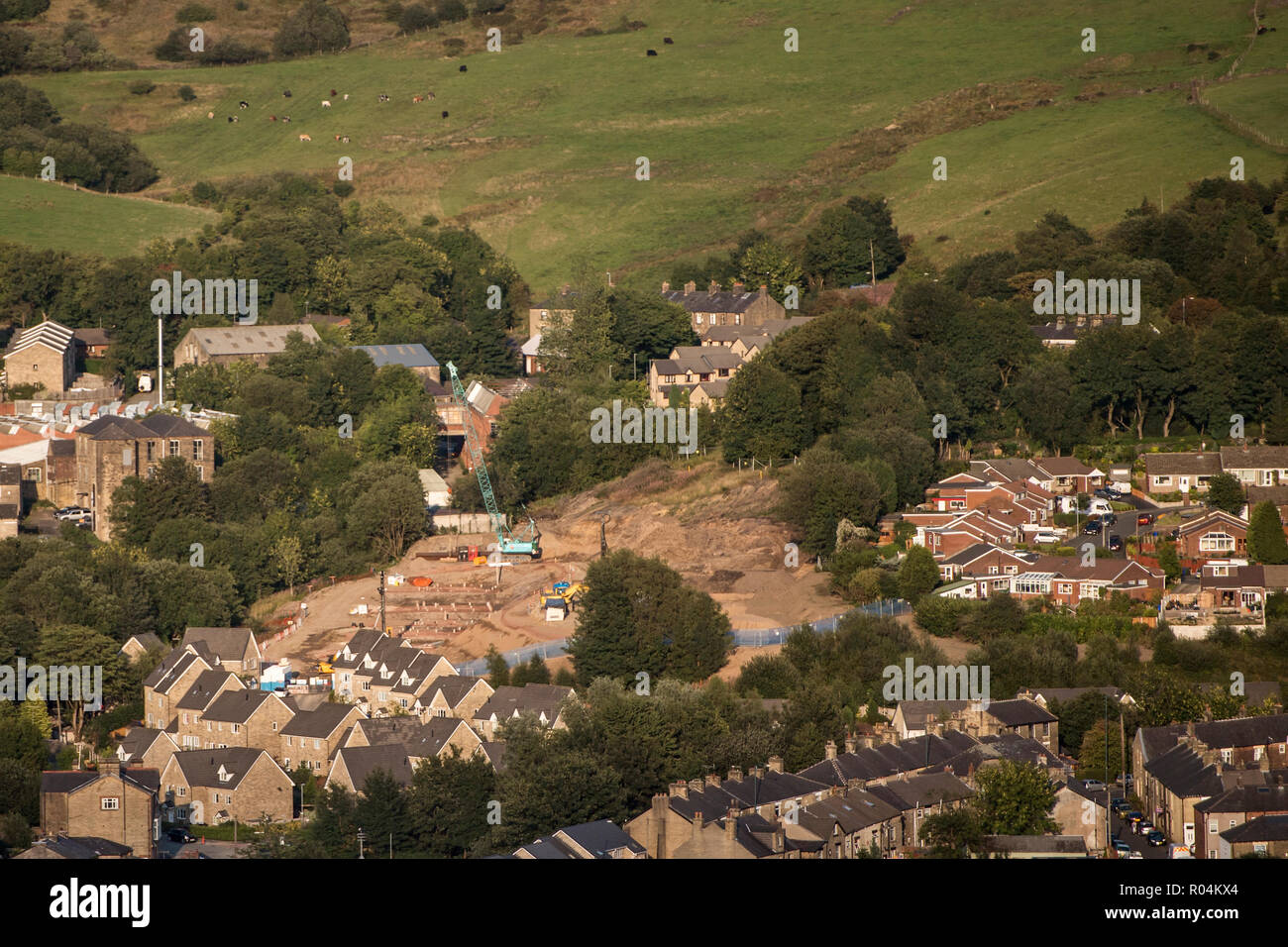 Vista generale di case residenziali essendo costruito in Mossley, Greater Manchester Foto Stock