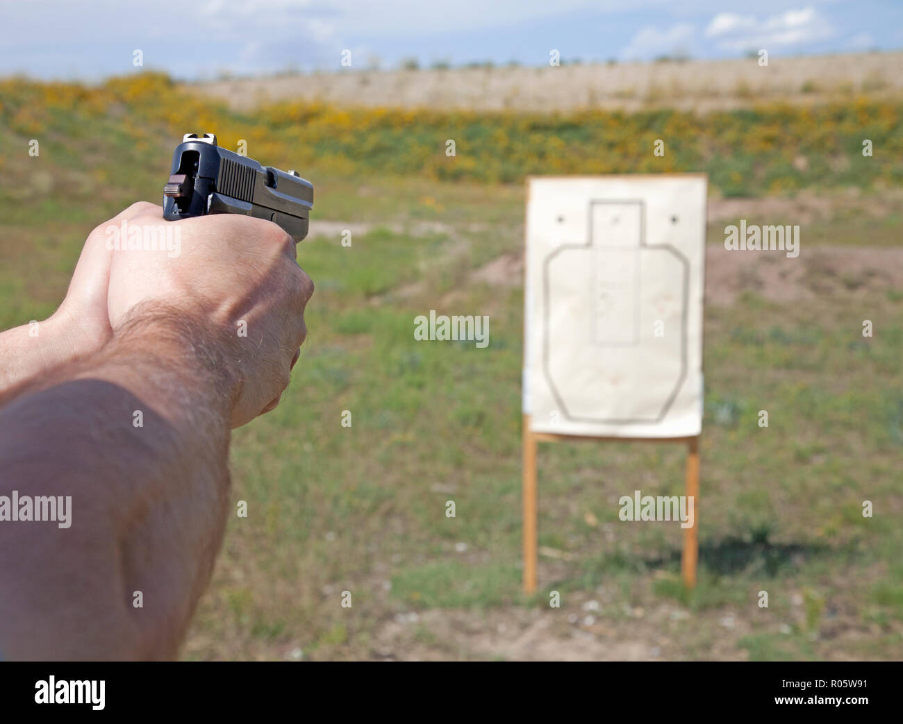 Pistola di tiro al poligono di tiro. Foto Stock