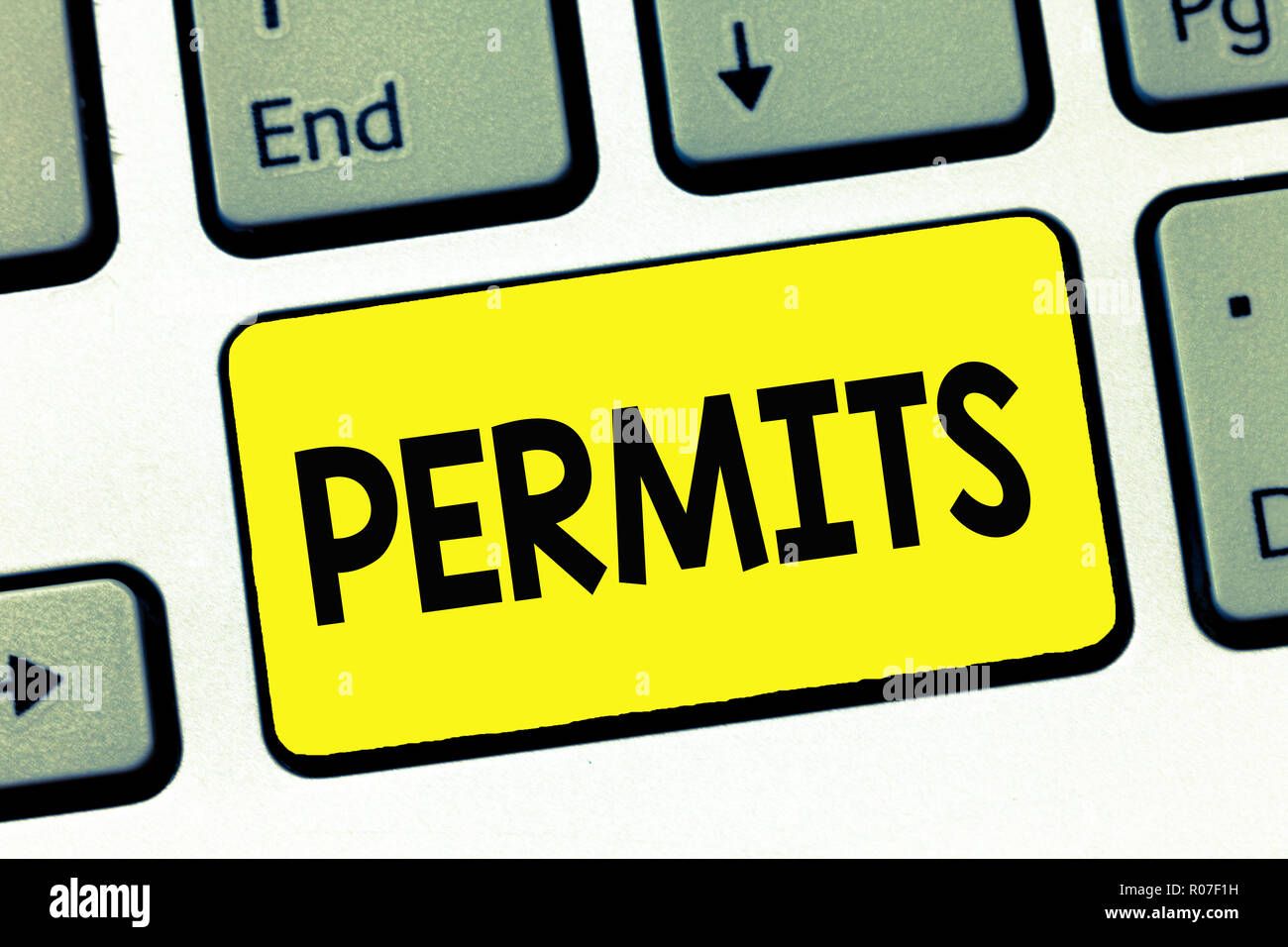 Parola di scrittura di testo consente l. Il concetto di business per ufficialmente consentire a qualcuno di fare qualcosa di permesso di documenti legali. Foto Stock