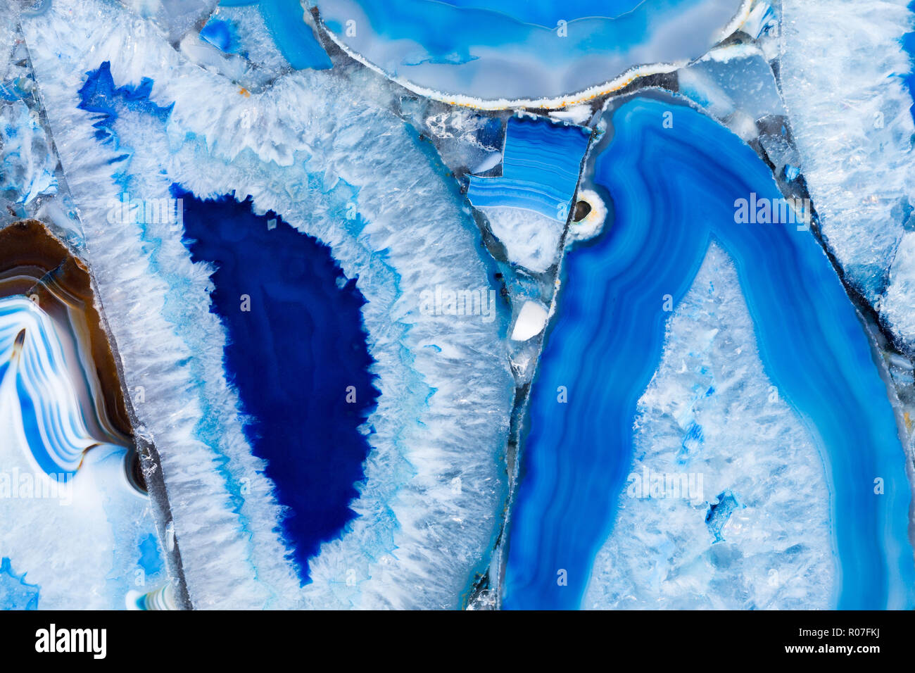 Il contrasto agat texture con deliziosa ornamentali superficie blu. Foto Stock
