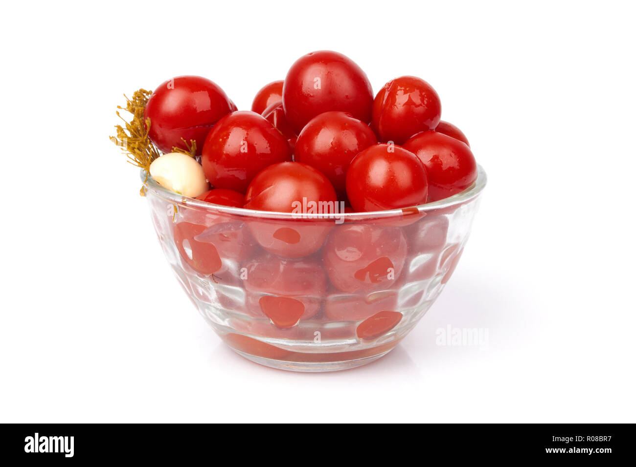 Marinaded di pomodoro nel recipiente isolato Foto Stock