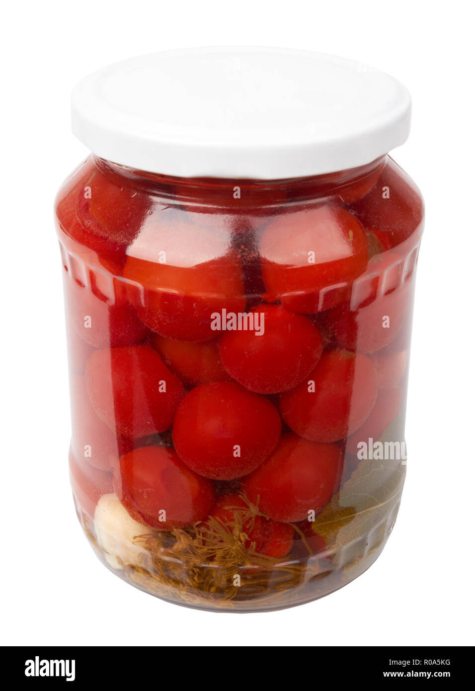 Vasetto di pomodori in scatola isolata su bianco Foto Stock