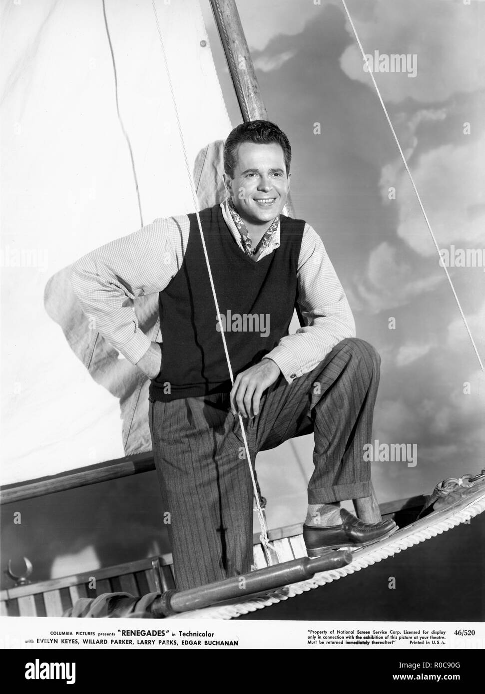 Attore Larry Parkes, pubblicità ritratto su barca a vela per il film "traditori", Columbia Pictures, 1946 Foto Stock