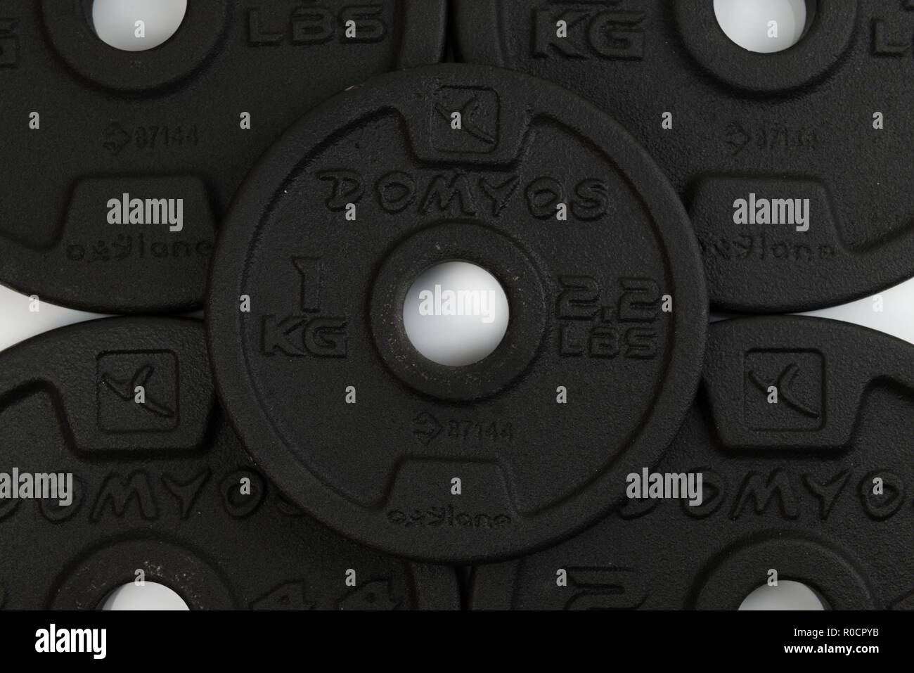 Acciaio nero pesi per manubri dal brand Domyos. metà, uno e due pesi per  chilogrammo Foto stock - Alamy
