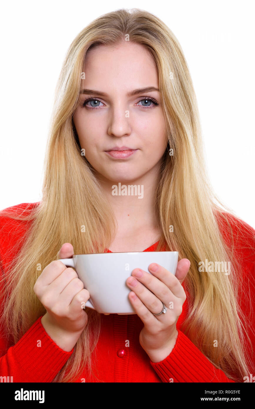 Volto del giovane bella ragazza adolescente holding tazza da caffè Foto Stock