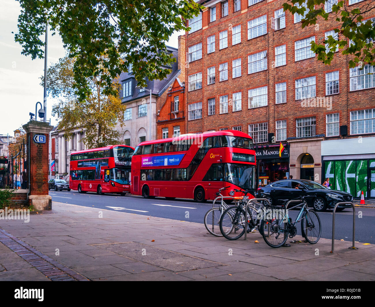 Autobus rossi di Londra, Kings Road, il Chelsea Foto Stock