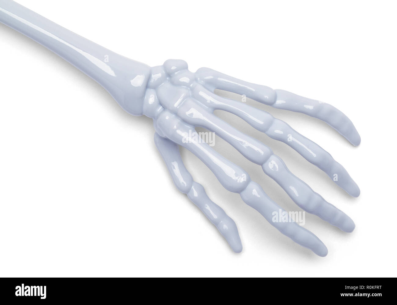 Halloween scheletro di plastica lato isolato su uno sfondo bianco. Foto Stock