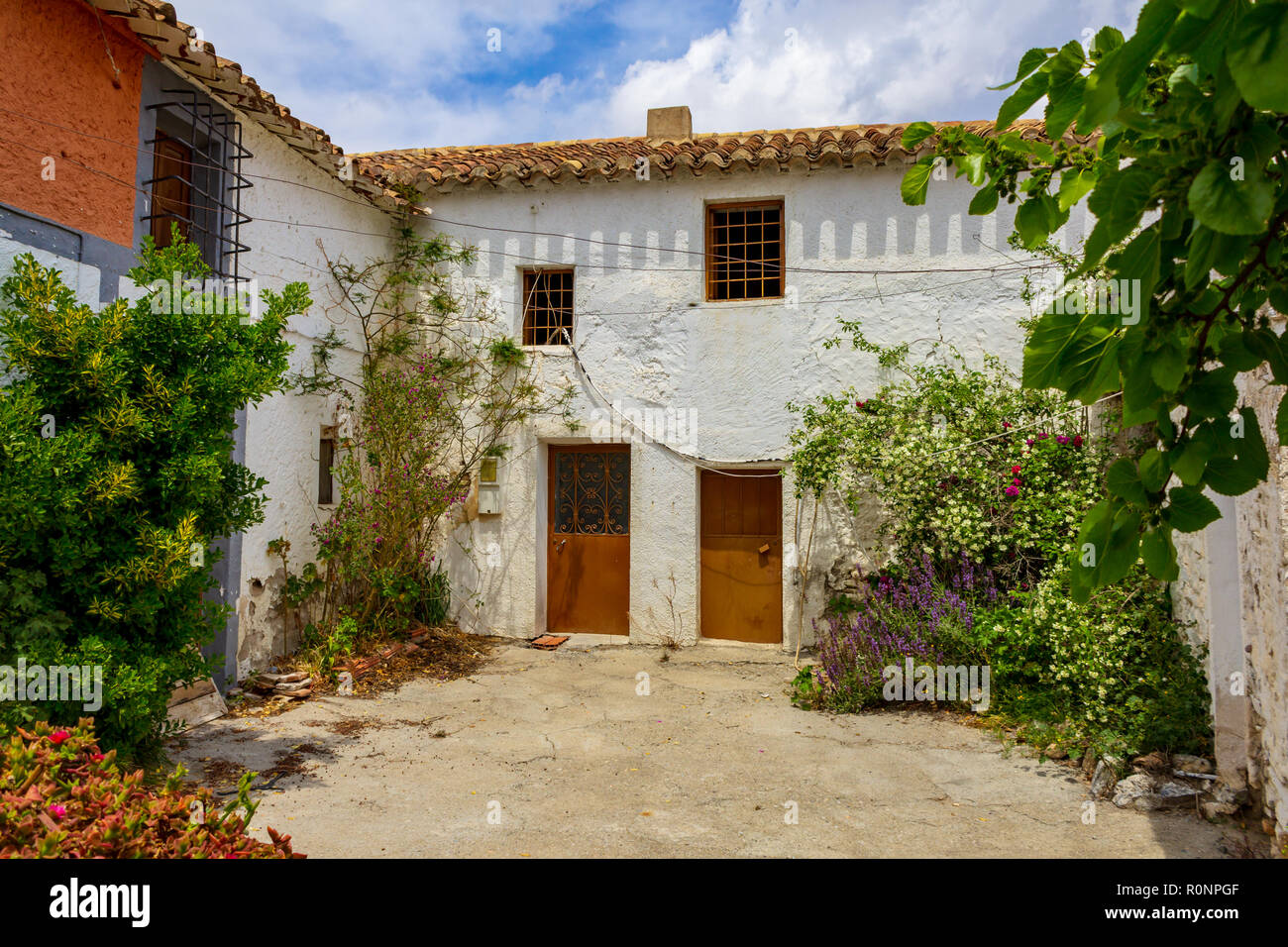Vecchie case rurali spagnole in un cortile, Almanzora Valle, Almeria provincia, Andalucía, Spagna Foto Stock