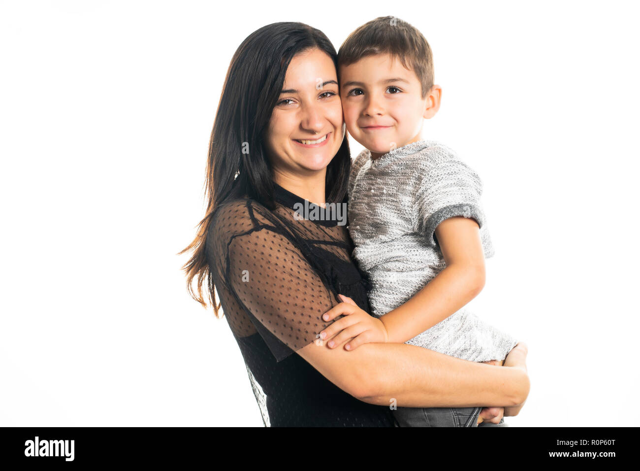 Una madre e figlio studio su sfondo bianco Foto Stock