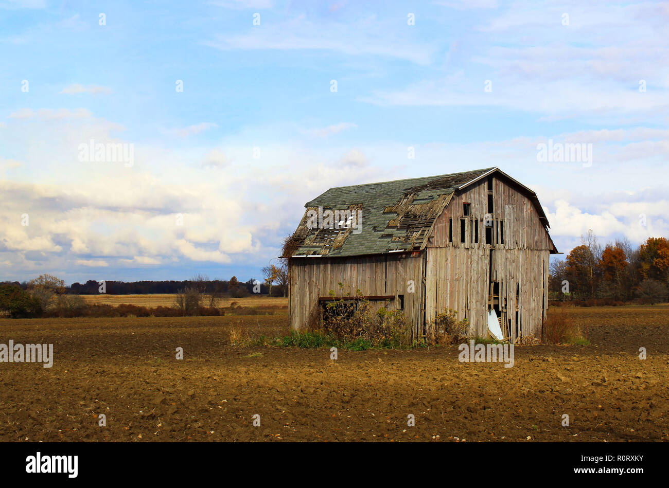Il vecchio fienile degradato Foto Stock