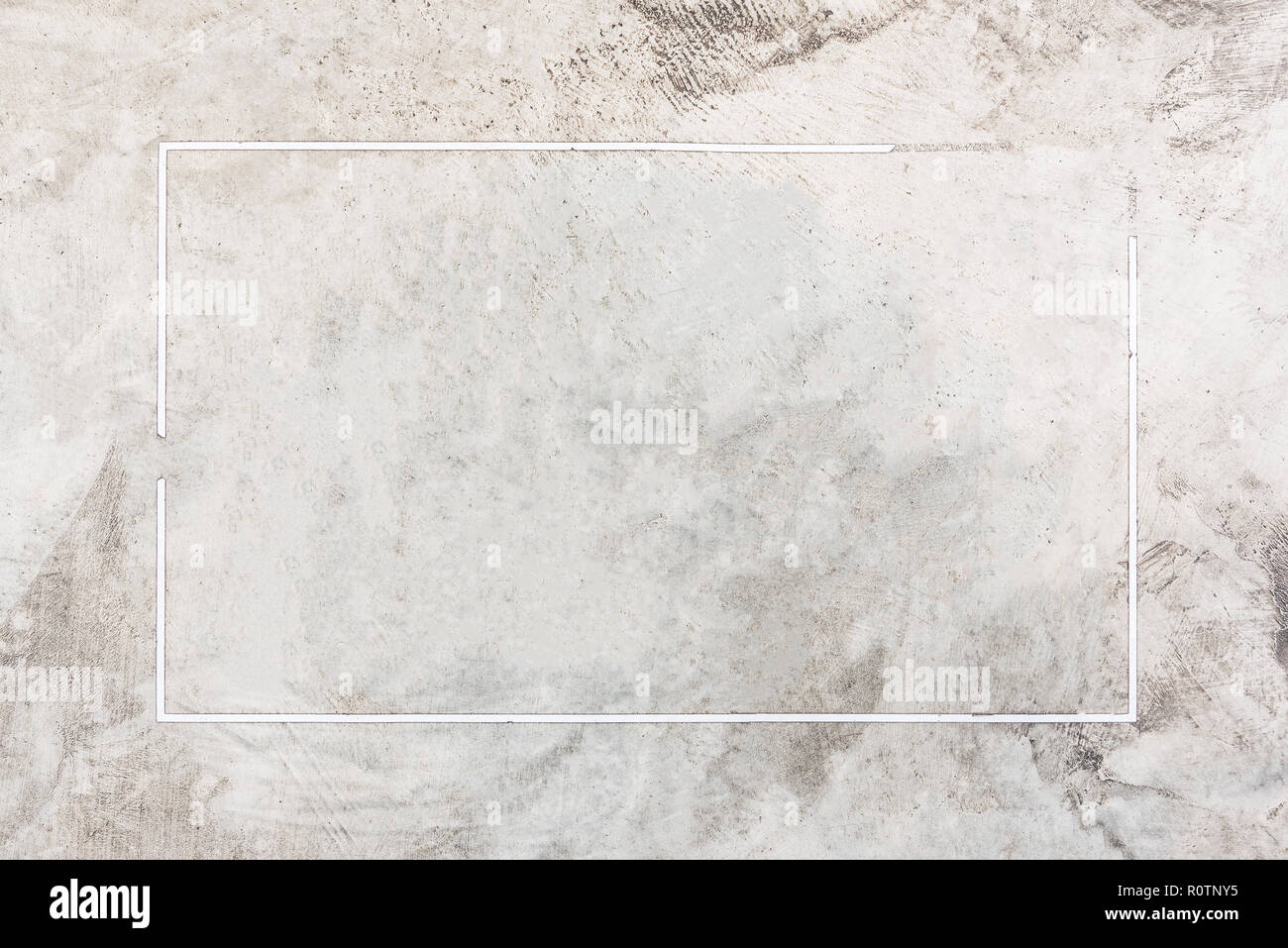 Sfondo astratto dal vecchio cemento texture con la linea bianca come cornice. Spazio vuoto per la pubblicità. Vintage e retrò filtrato. Foto per aggiungere del testo Foto Stock