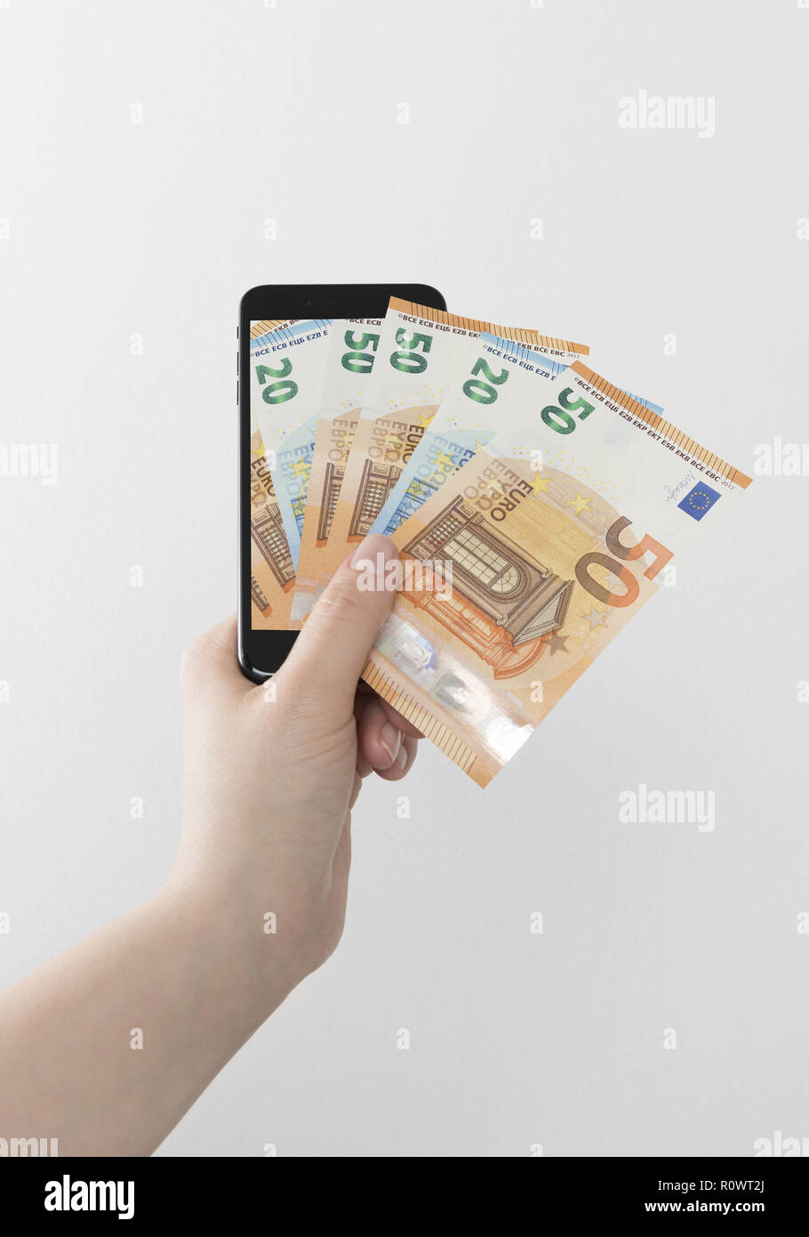 Bezahlen per Smartphone Foto Stock
