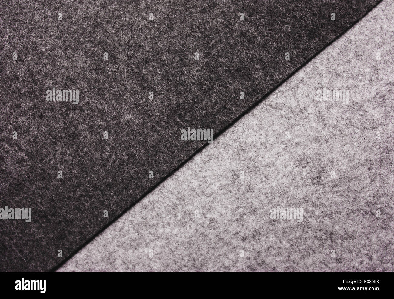 La texture di feltro di lana. Caldo, astratta, morbido e uno sfondo grigio. Foto Stock