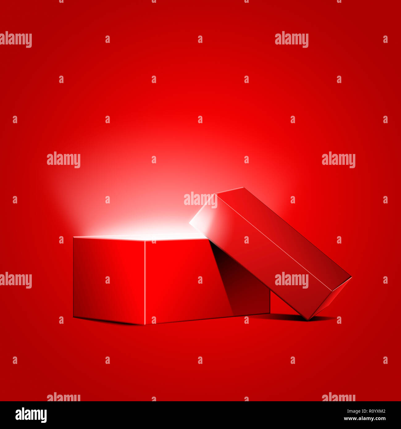 Luce soffusa che si irradiano da aperto confezione regalo rossa contro lo sfondo rosso Foto Stock