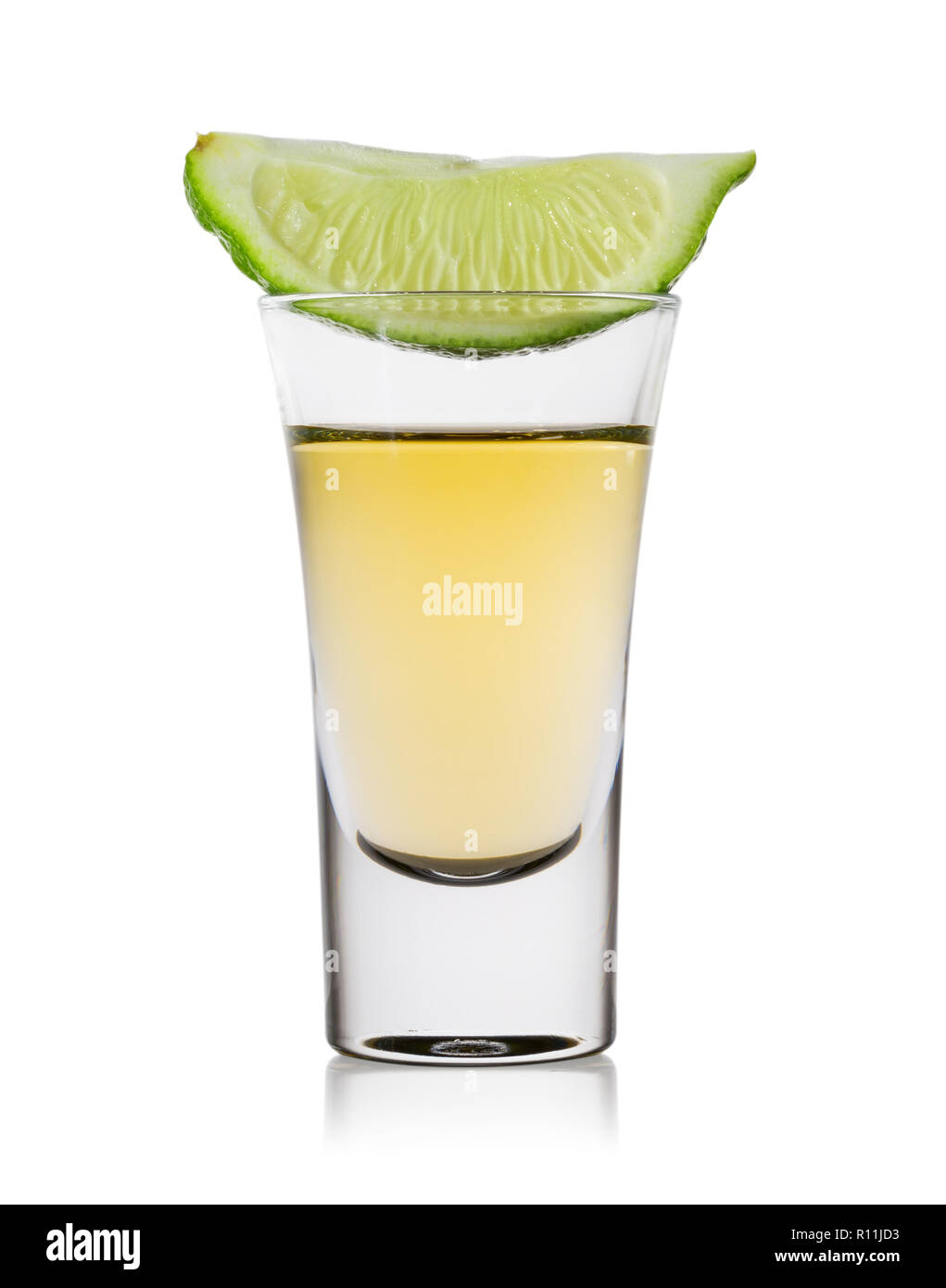 Bicchiere di tequila con fetta di limone Foto Stock