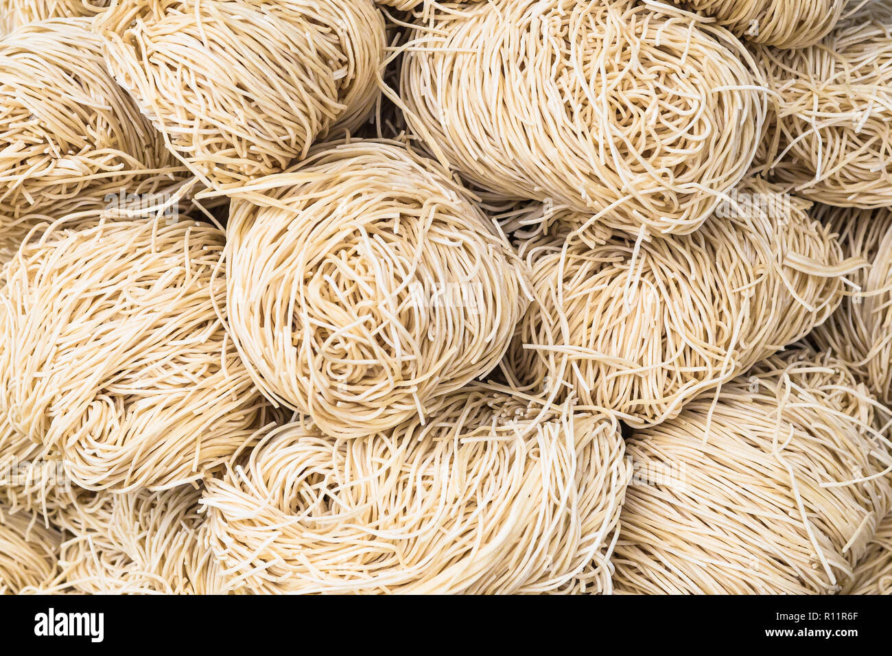 Sfondo di cibo - non cotte tagliatelle Foto Stock