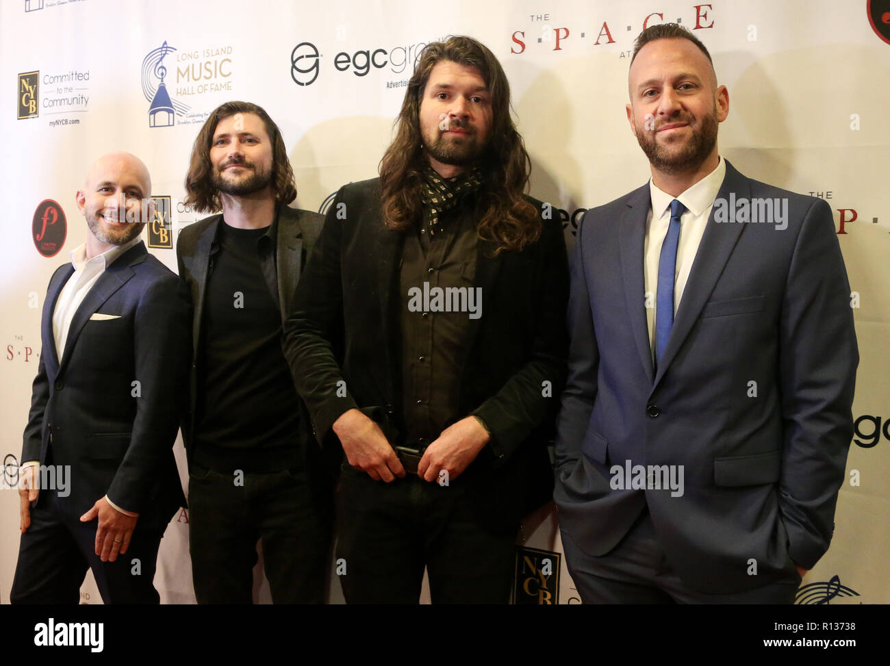 Westbury, Stati Uniti. 08 Nov, 2018. WESTBURY, NY - Nov 8: (L-R) Shaun Cooper, John Nolan, Adam Lazzara e Mark O'Connell di tornare domenica frequentare il 2018 Long Island Music Hall of Fame cerimonia di investitura presso lo spazio al Westbury il 8 novembre 2018 in Westbury, New York. Credito: la foto di accesso/Alamy Live News Foto Stock