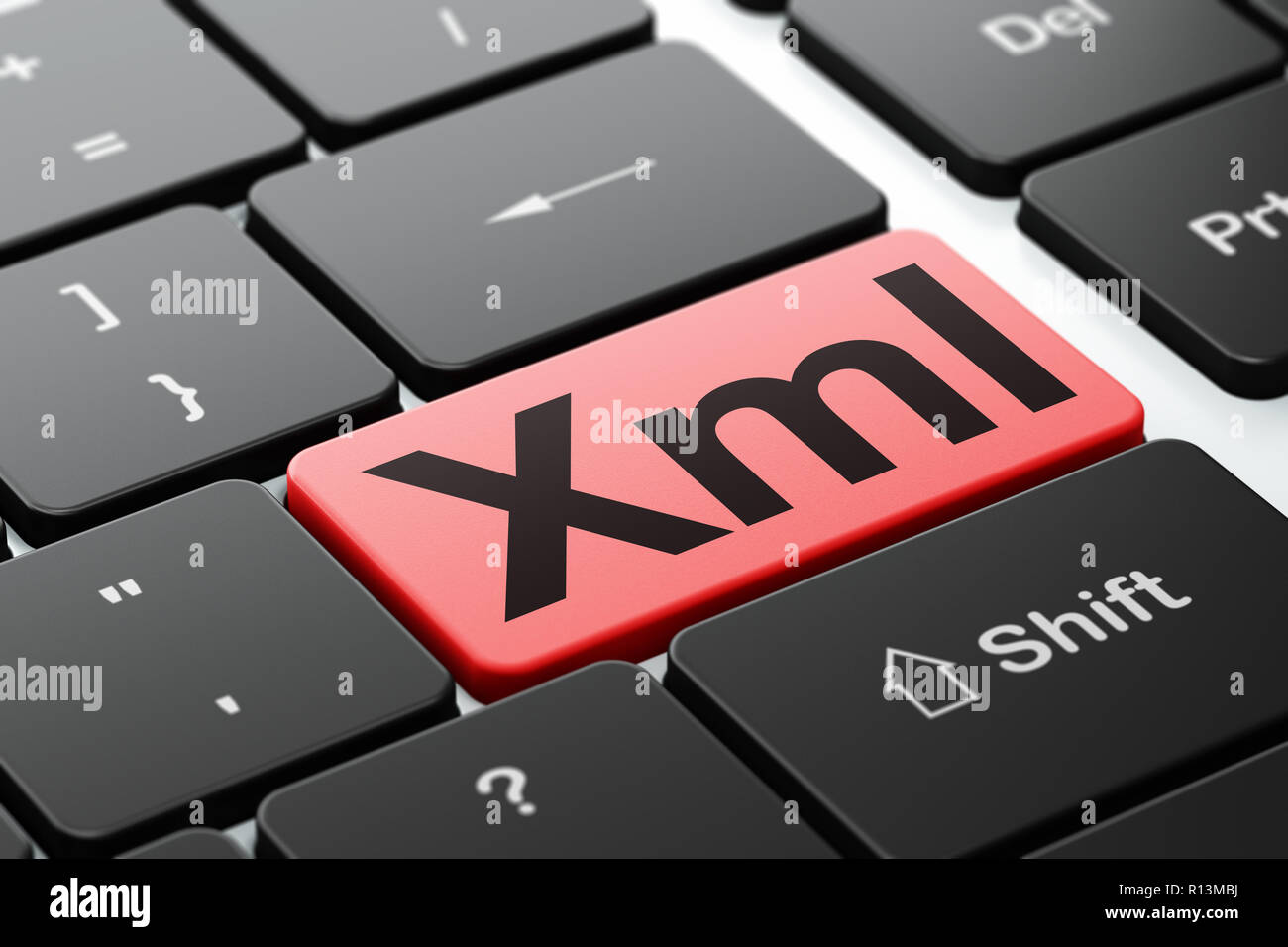 Il concetto di Software: xml sul computer sullo sfondo della tastiera Foto Stock