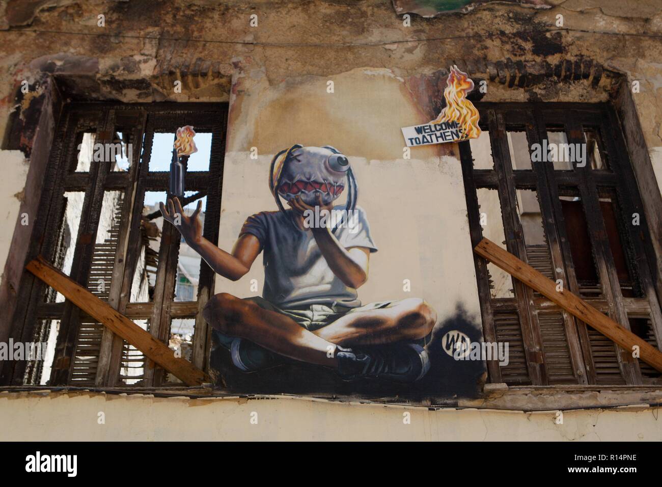 Greco crisi economica ispira artisti di graffiti che esprimono i loro pensieri sulla parete di Atene. Foto Stock