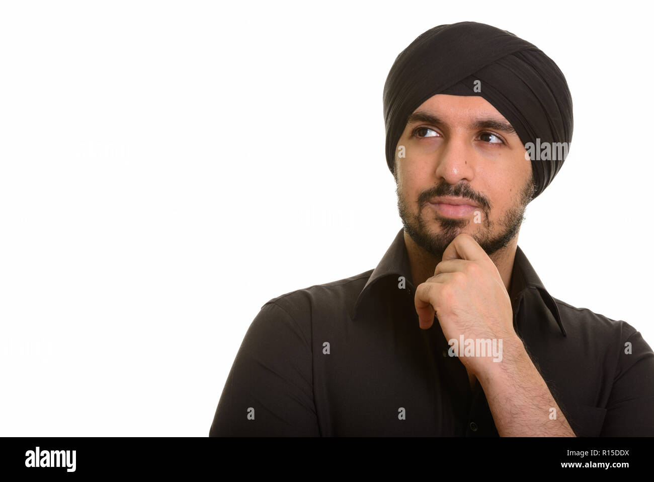 Ritratto di giovani indiani Sikh pensiero uomo Foto Stock