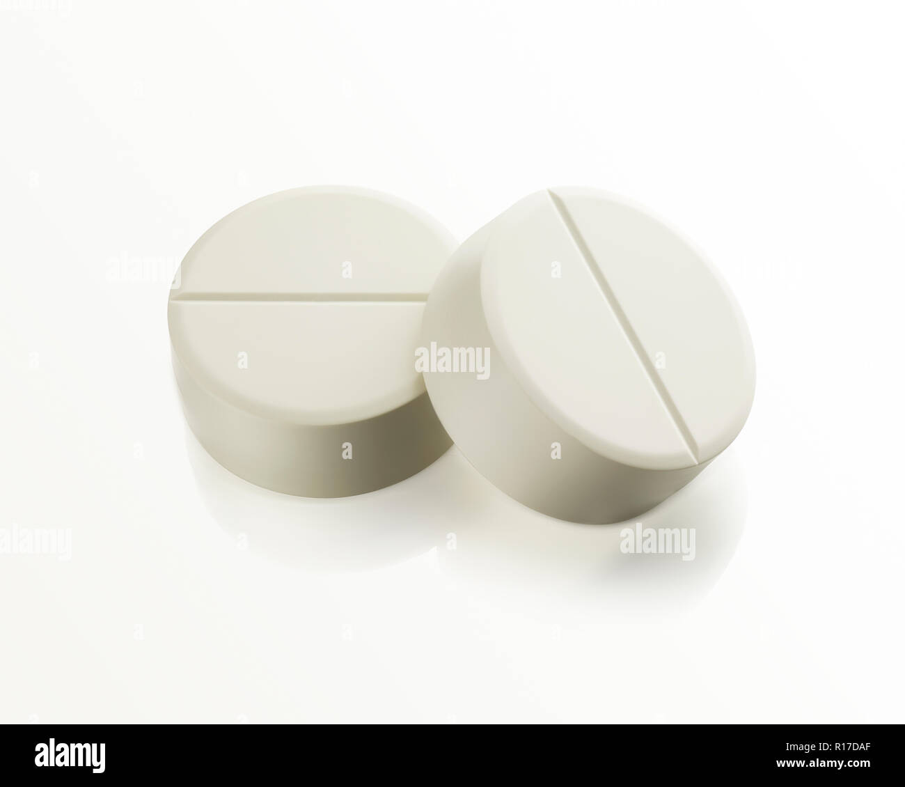Due bianchi farmaco pillola compresse, still life Foto Stock