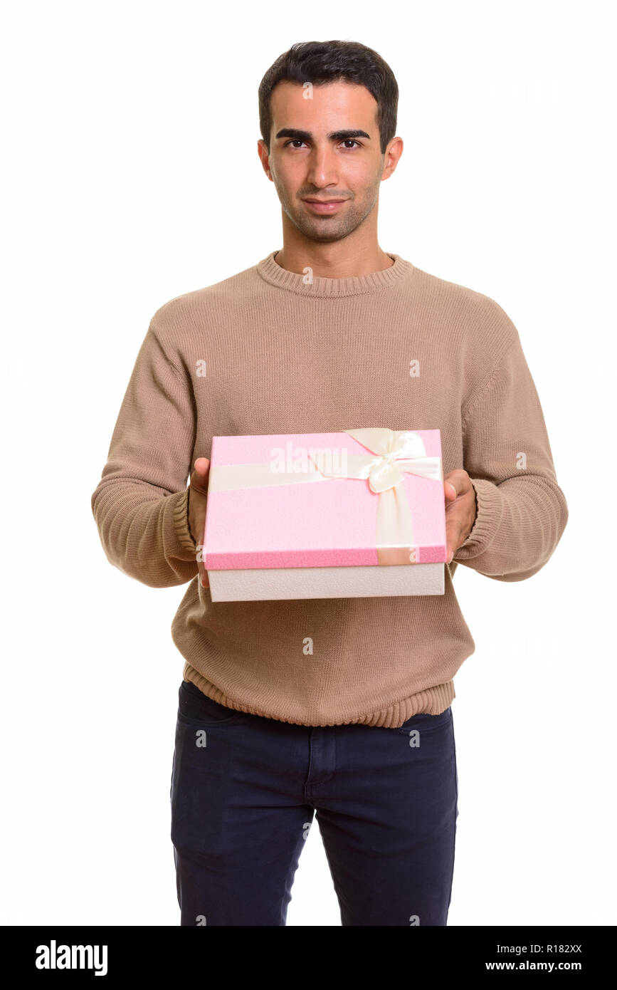 Ritratto di giovane bello uomo persiano azienda confezione regalo Foto Stock
