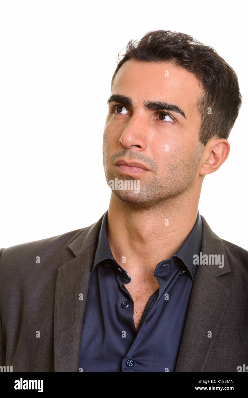 Ritratto di giovane bello imprenditore persiano pensando Foto Stock