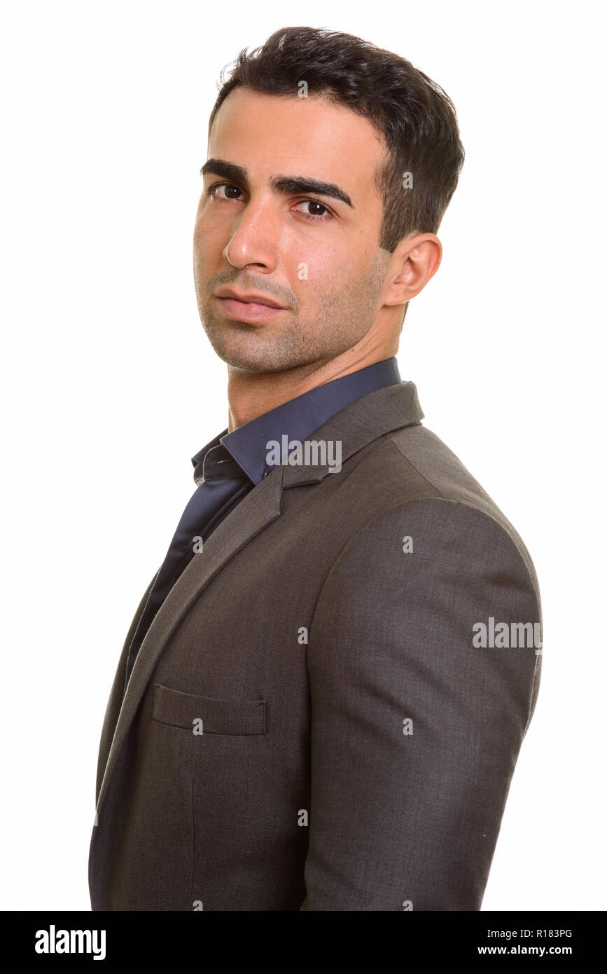 Ritratto di giovane bello imprenditore persiano contro uno sfondo bianco Foto Stock