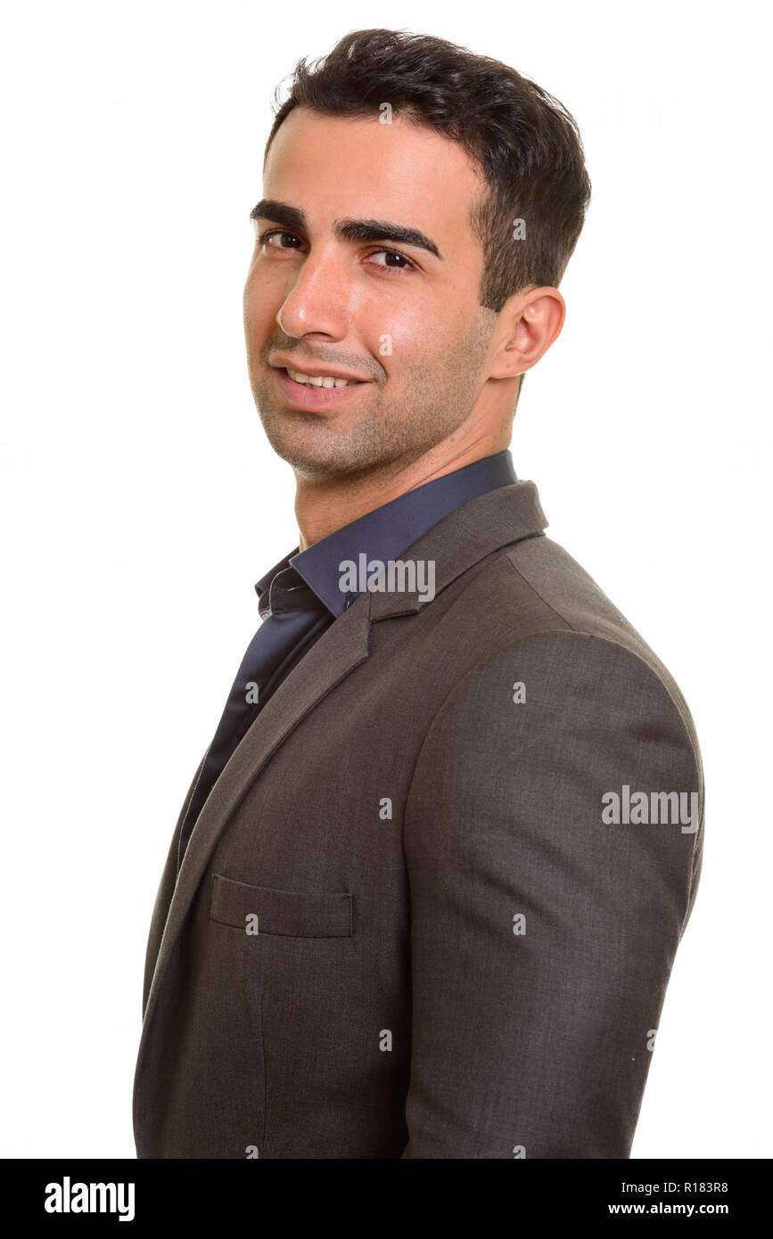 Ritratto di giovane bello imprenditore persiano contro uno sfondo bianco Foto Stock