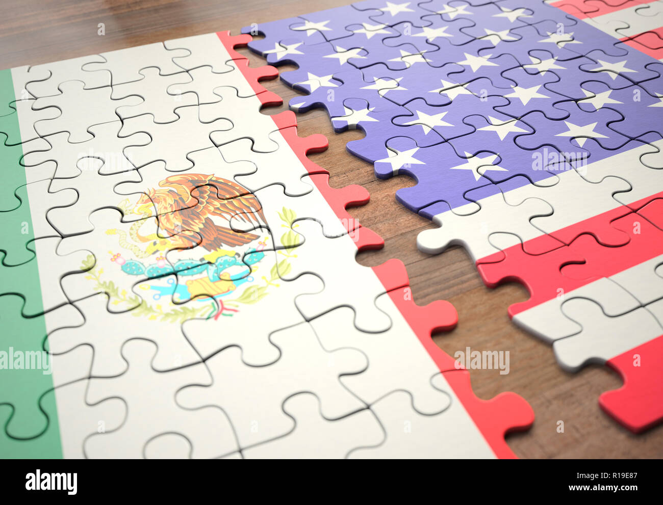 Due nazioni in un gioco di puzzle che rappresenta la divisione dei paesi dai confini di frontiera. Foto Stock