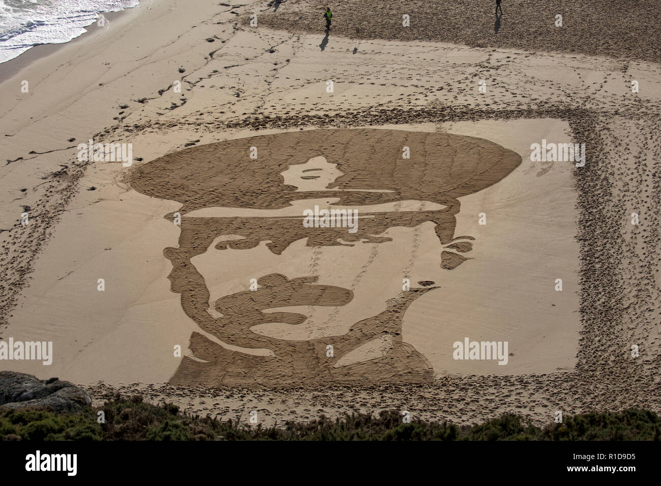 Porthcurno, Cornwall, Regno Unito. 11 Nov 2018. Attraverso le sabbie del tempo; sand art; ispirato da Danny Boyle Credito: David Chapman/Alamy Live News Foto Stock