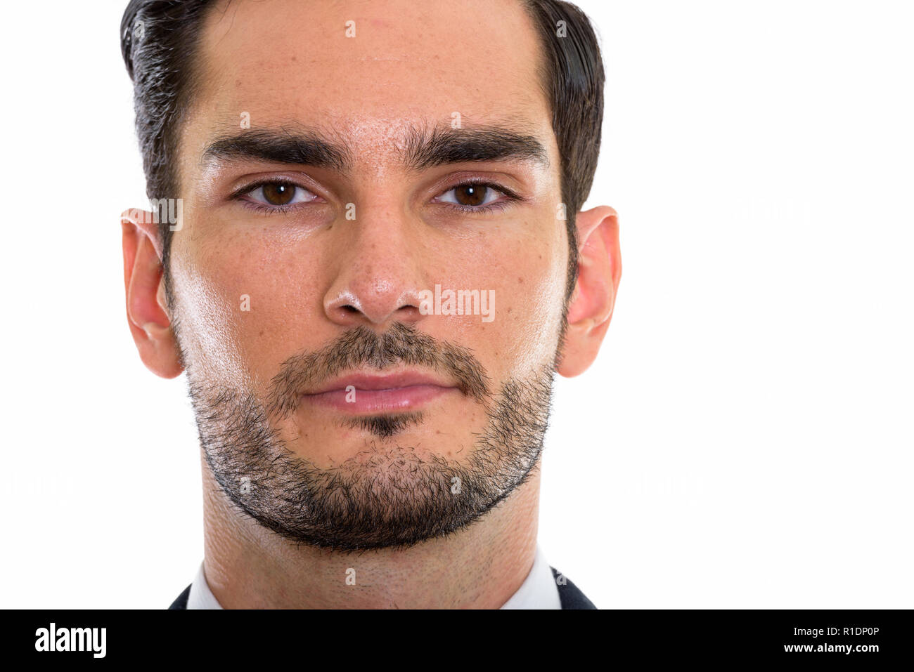 Chiusura del giovane imprenditore belli guardando la fotocamera Foto Stock