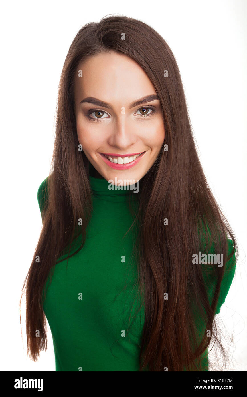 La donna in una verde turtleneck Foto Stock
