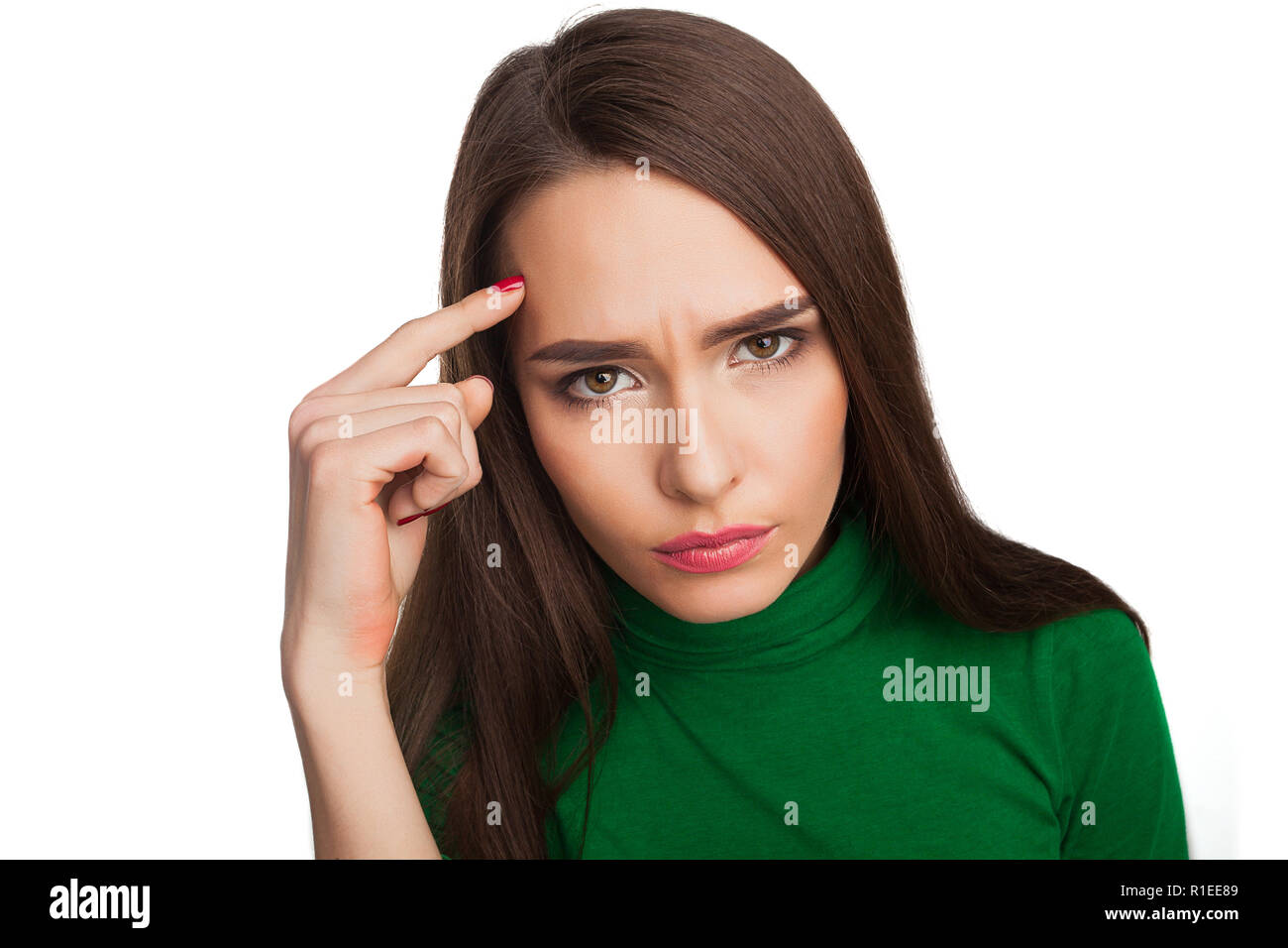 La donna in una verde turtleneck Foto Stock