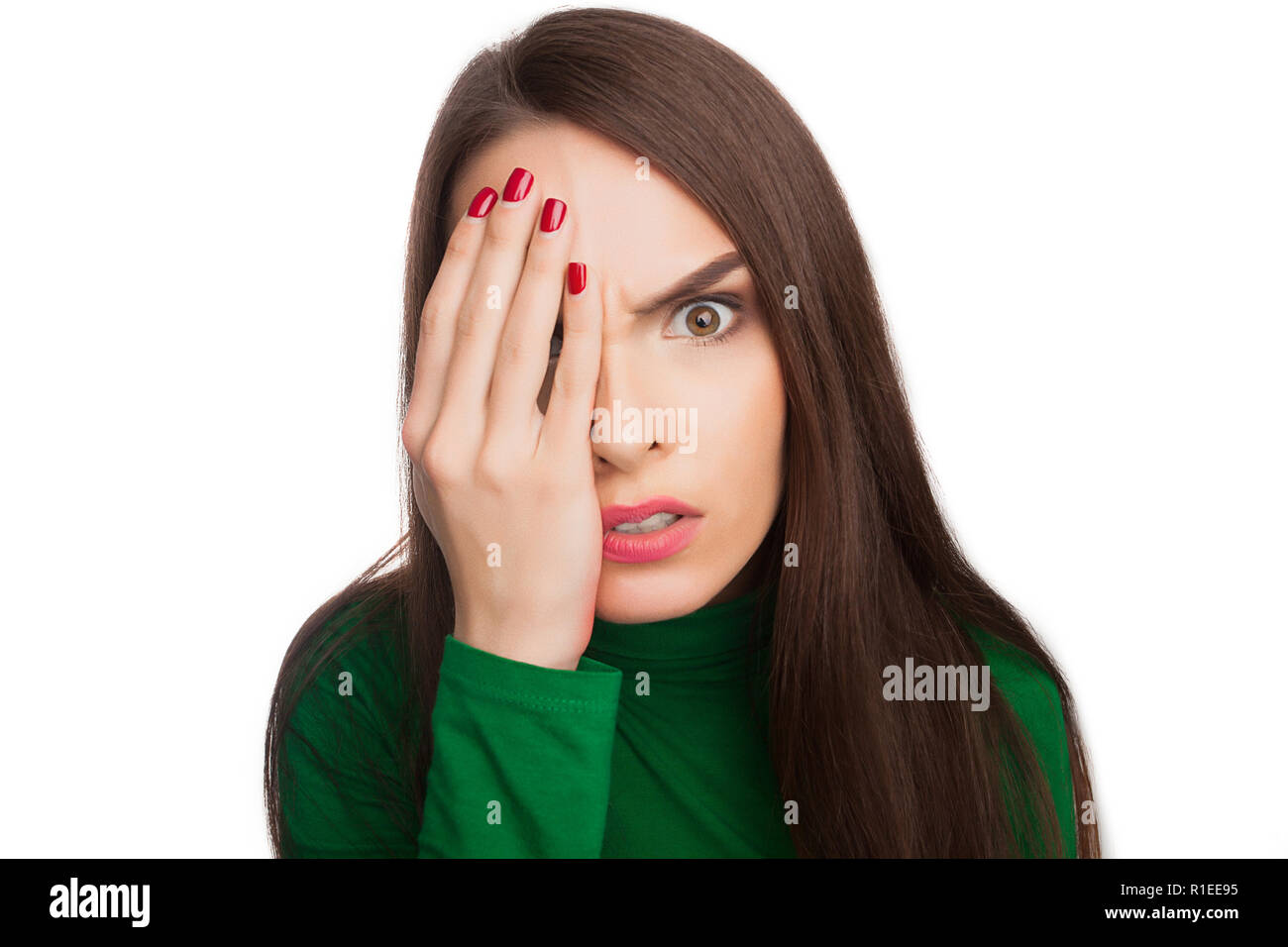 La donna in una verde turtleneck Foto Stock